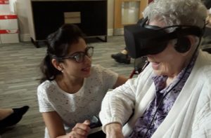 Benefits Beyond Hope for Dementia Patients Using Virtual Reality 2 resident trying virtual reality.jpg quantum care virtual reality dementia