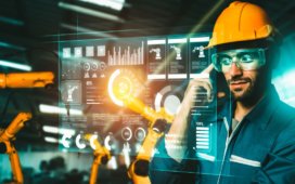 Augmented reality for workplace productivity - man using augmented reality glasses in manufacturing